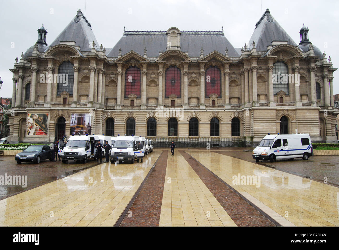 Palais des Beaux Arts with police force in attendance at Braderie time Stock Photo