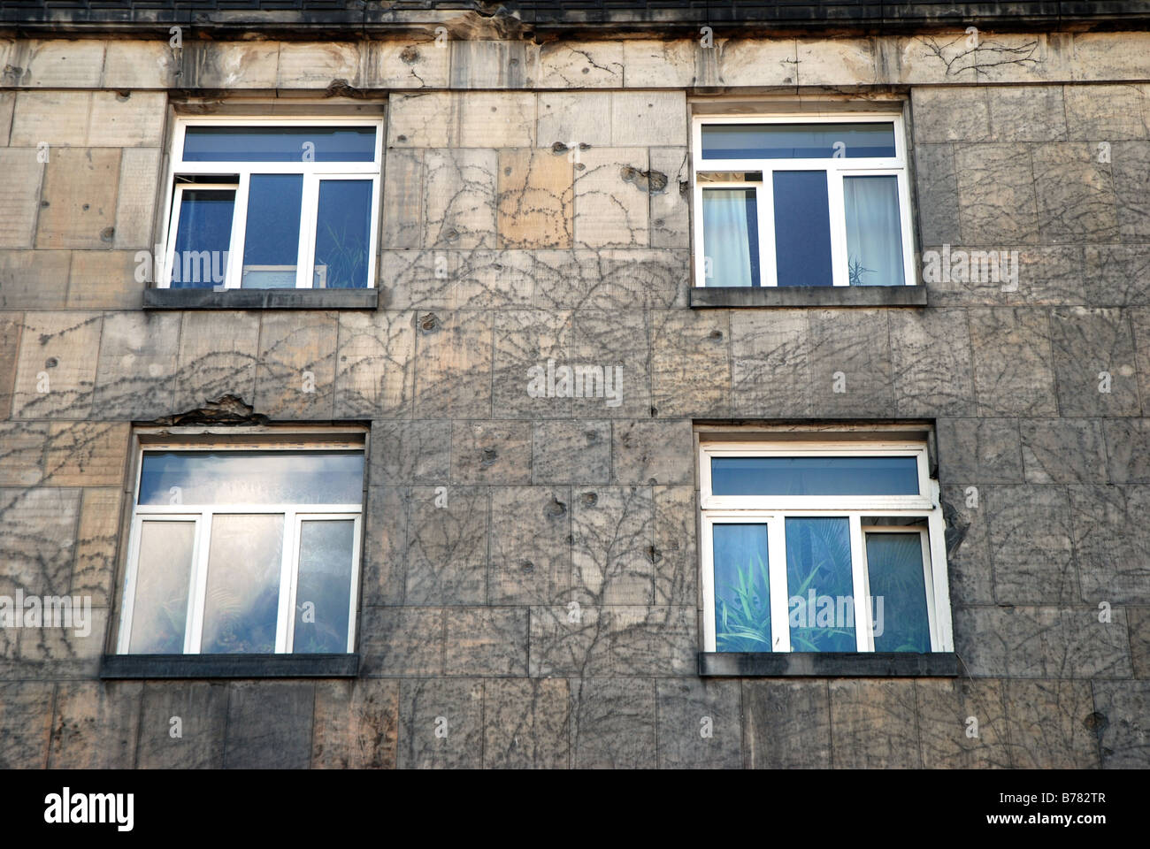 Remains of Warsaw Uprasing from 1944 against Nazi occupation. Bullet holes on the building wall, 11 Krakowskie Przedmiescie St. Stock Photo