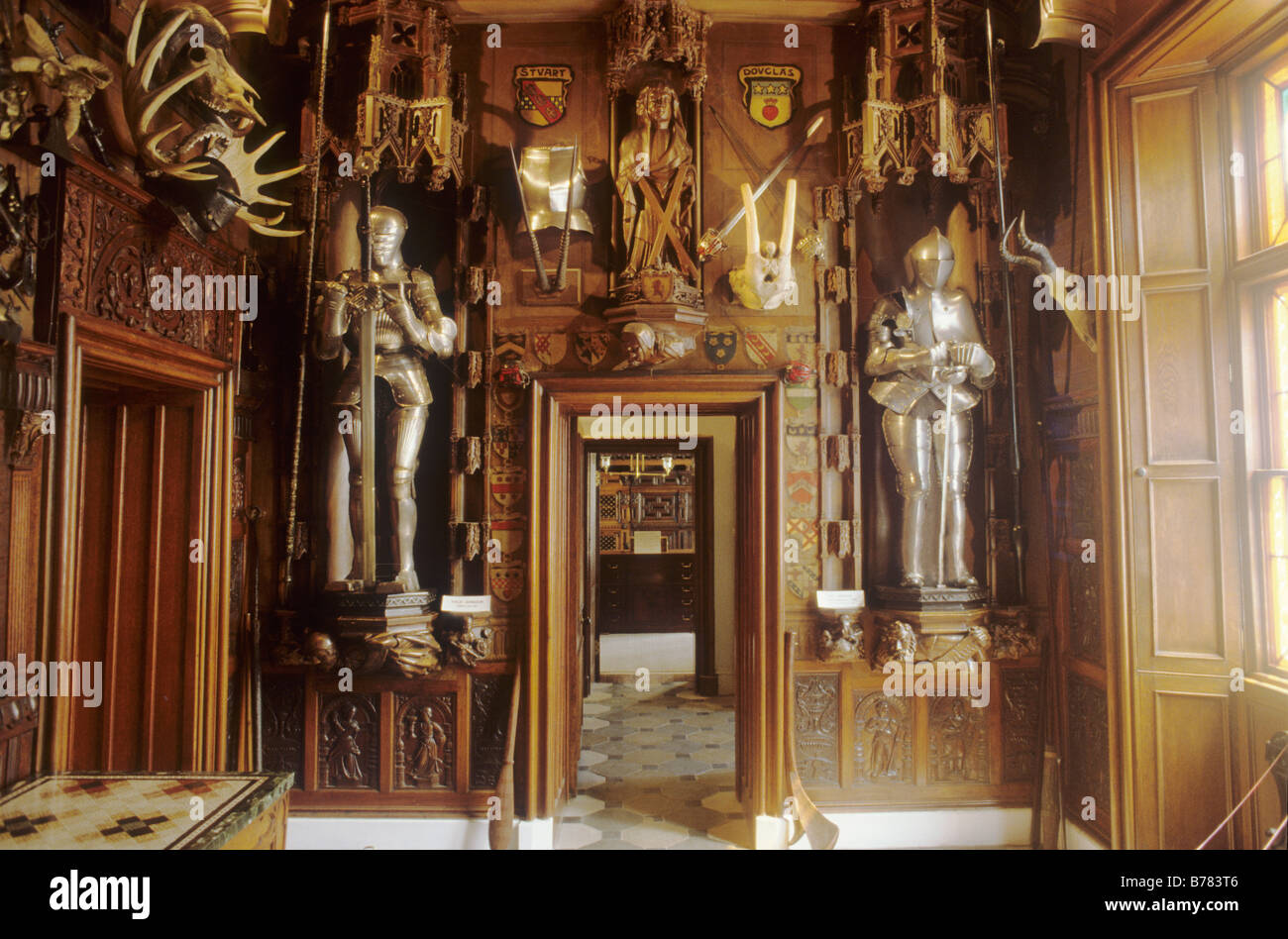 Abbotsford room interior Scotland UK suit of armour oak wood panels panelling Sir Walter Scott house Stock Photo