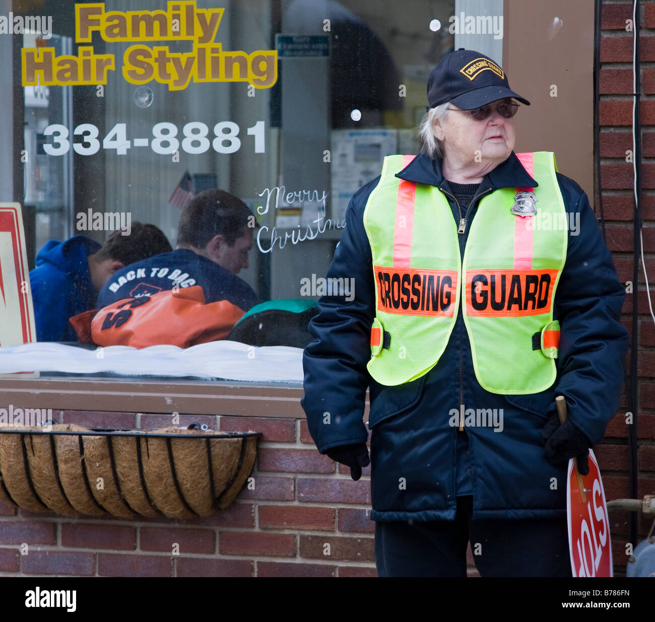 Female school crossing guard Stock Photo