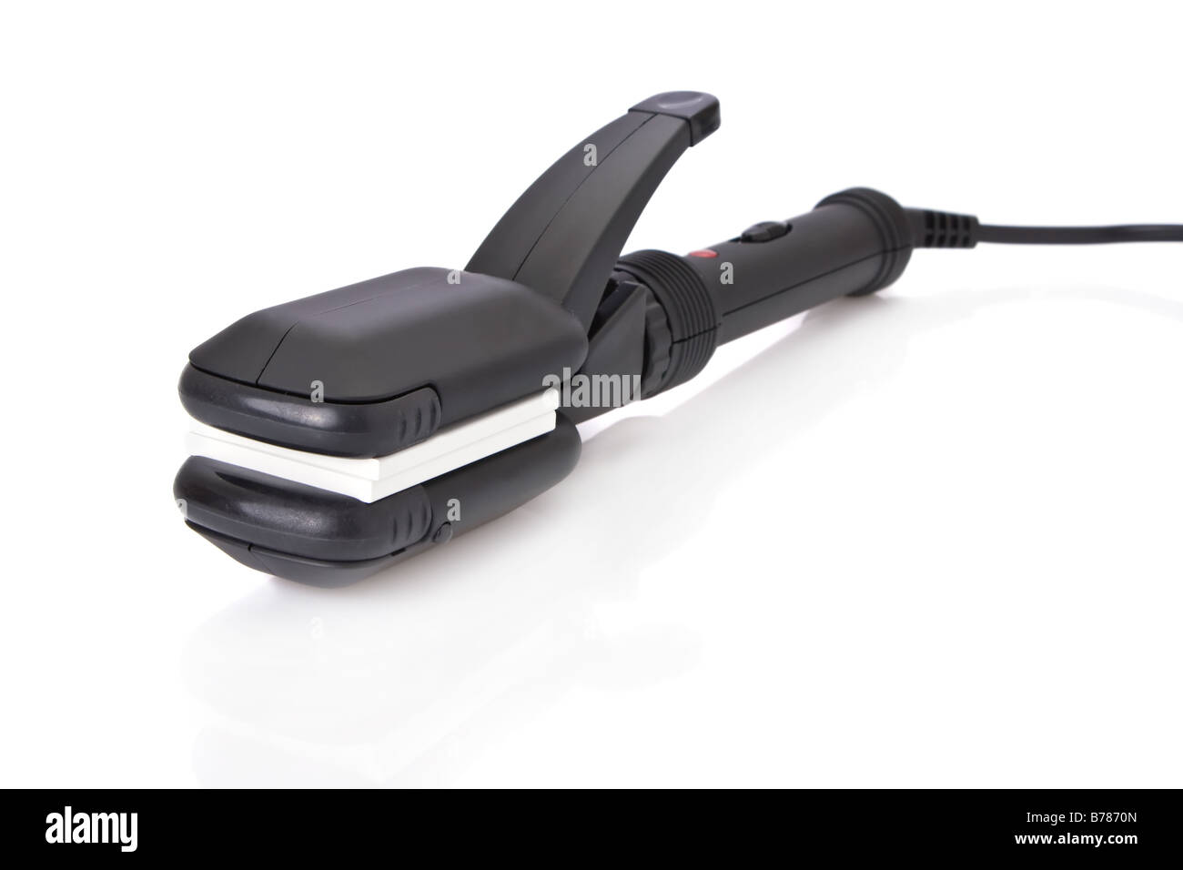 Hair straightener with ceramic plates isolated on white Stock Photo Alamy