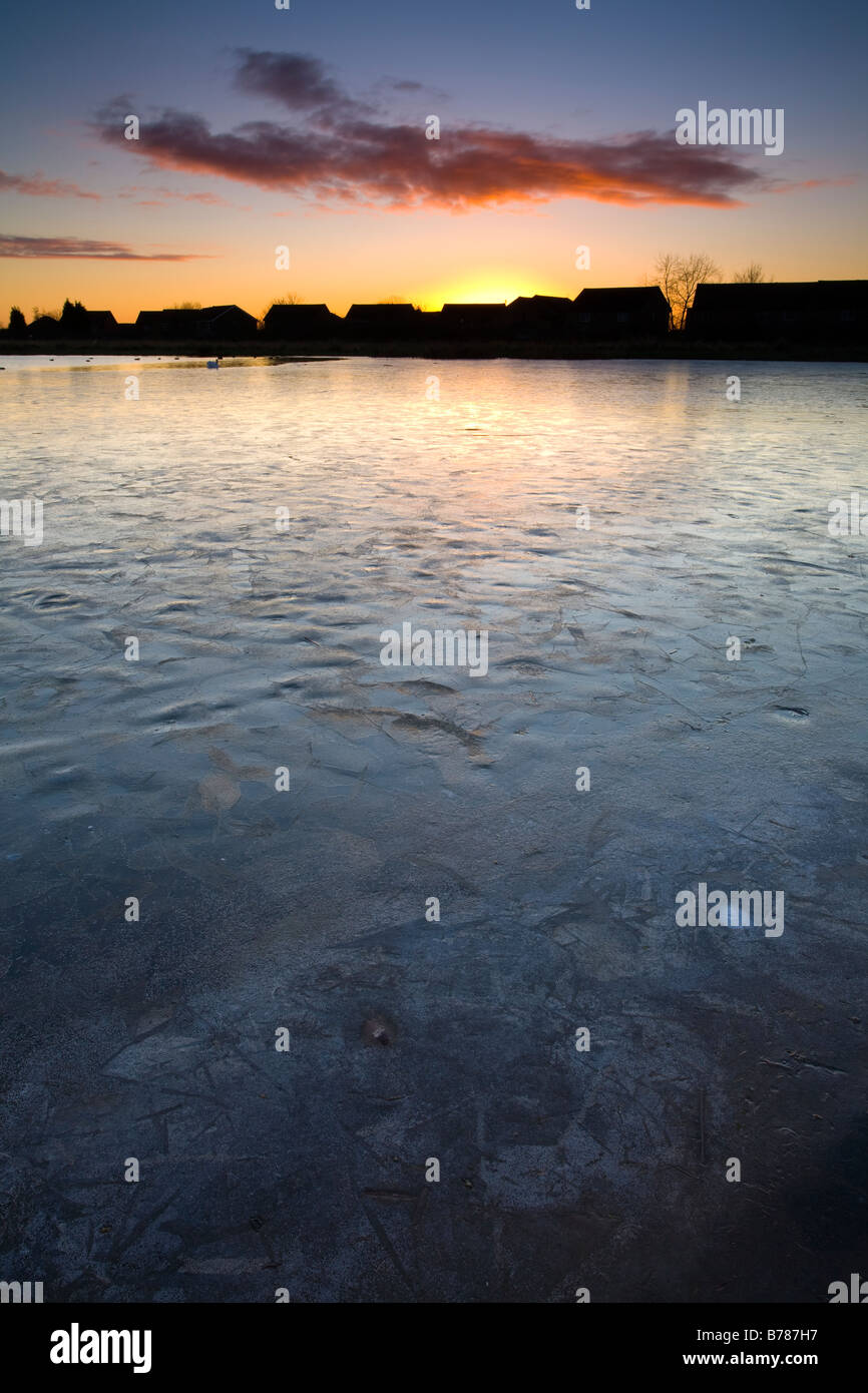 England, Tyne & Wear, Killingworth. Ice covered lake near to a