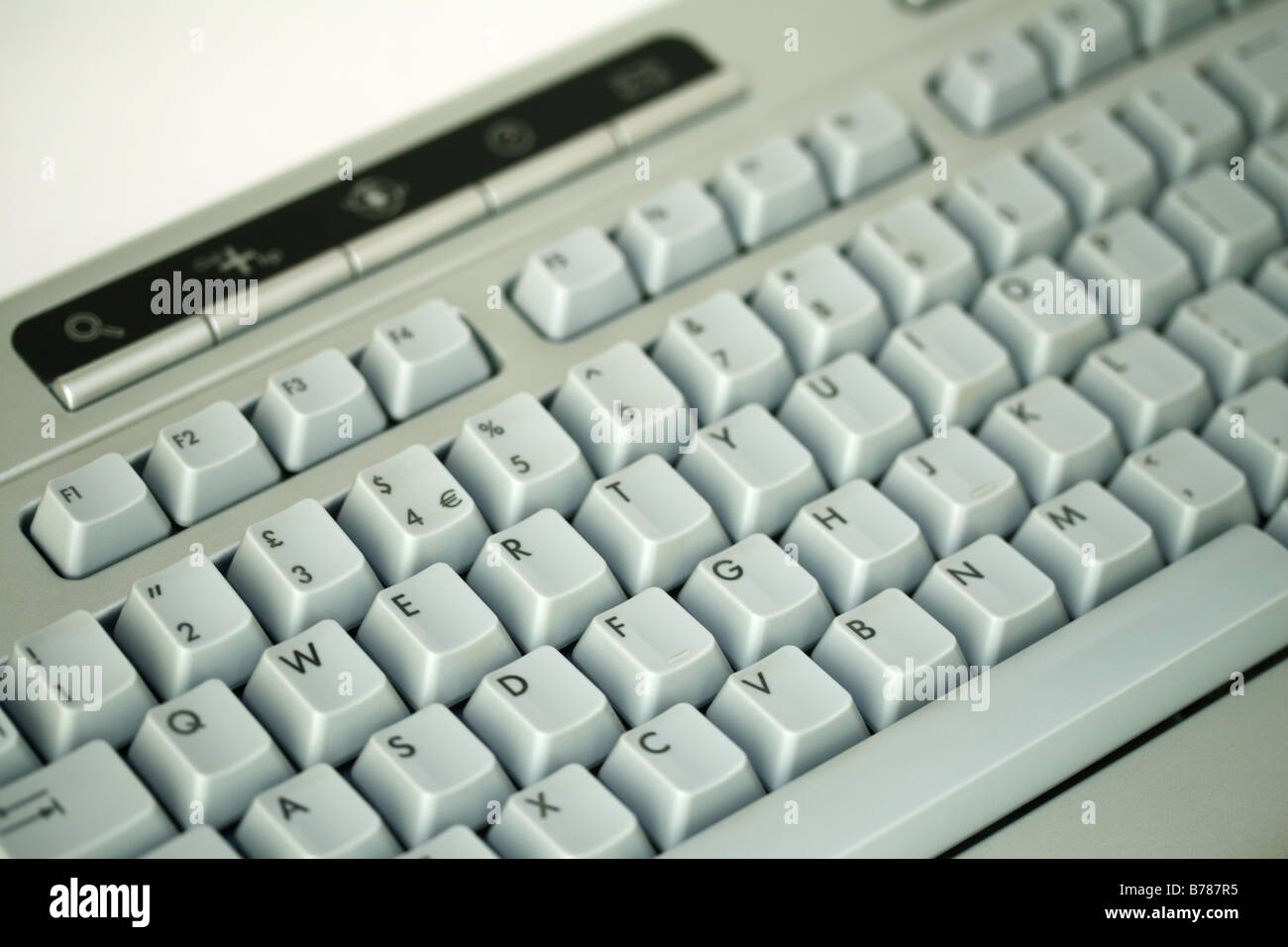 Silver and grey, wireless computer keyboard Stock Photo