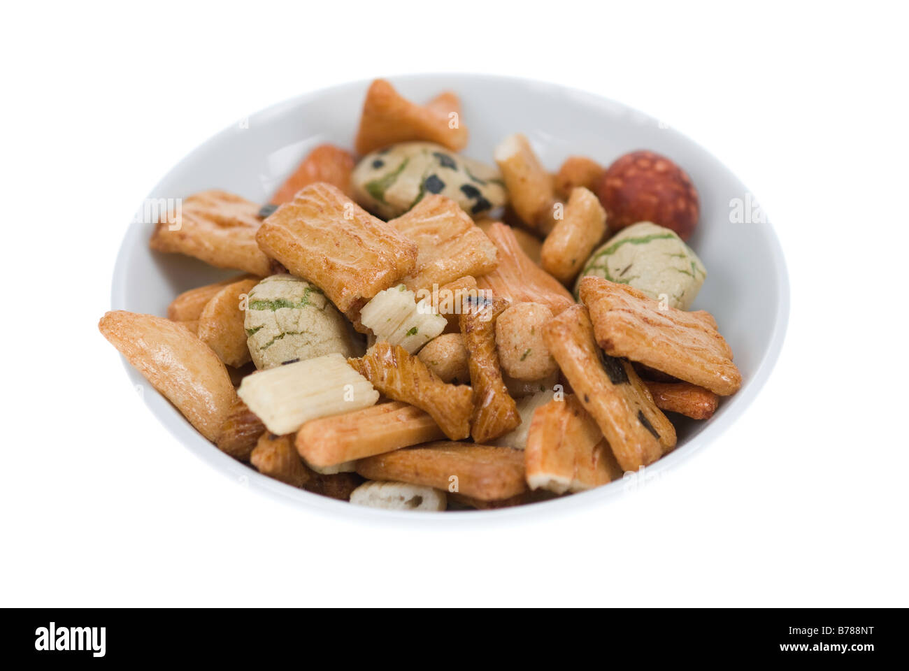 bowl of japanese rice crackers isolated on white Stock Photo