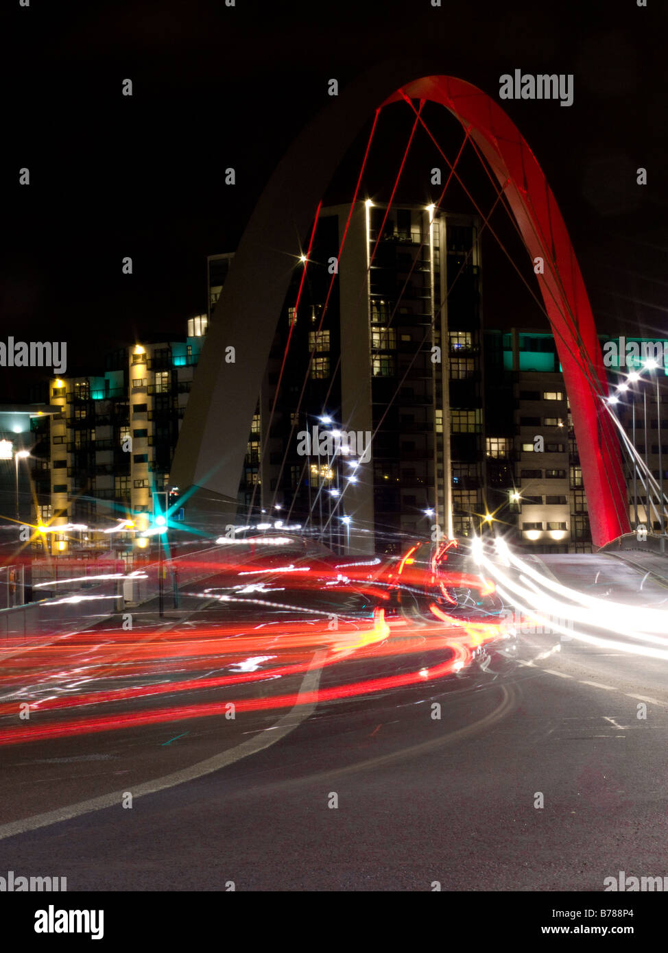 Clyde Arc over river Clyde and passing by car lights - Glasgow, Scotland Stock Photo