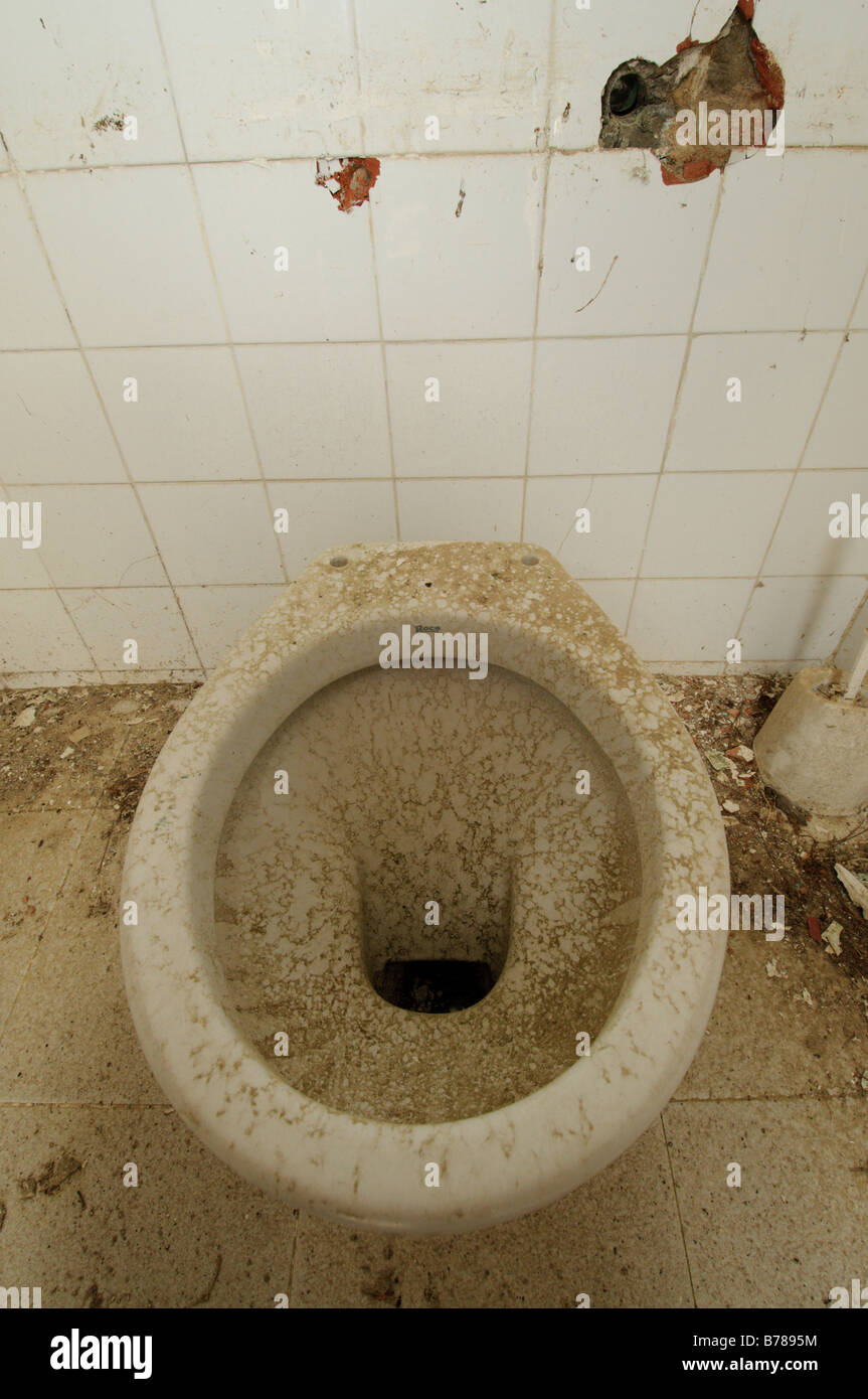 Abandoned vandalized lavatories at a former tourist camping facility Spain Stock Photo