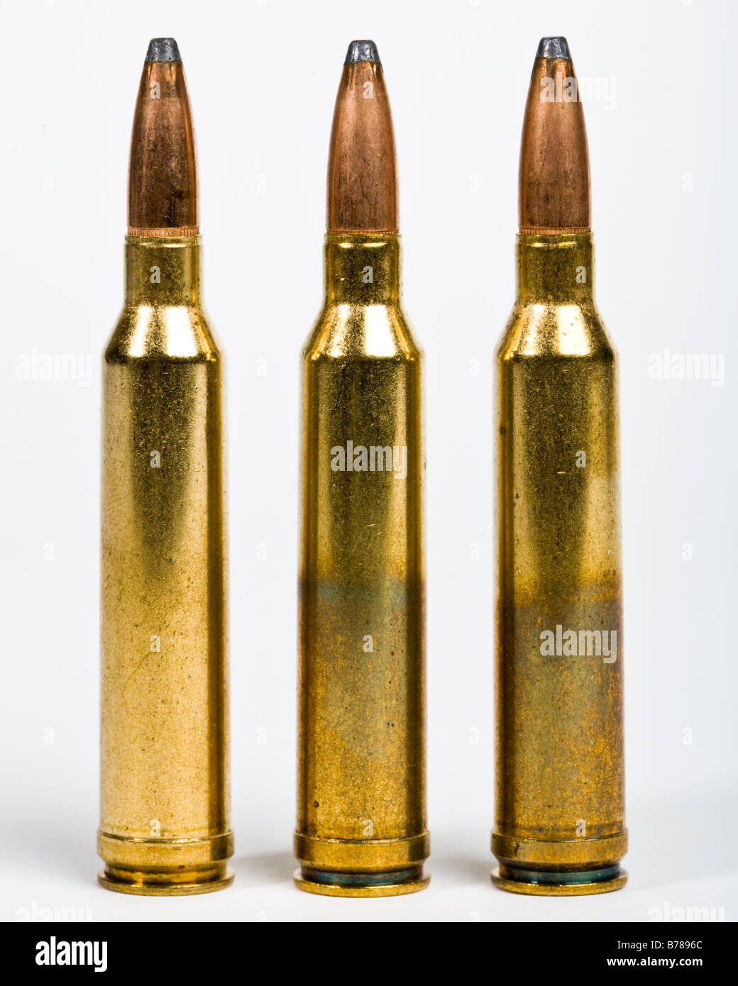 Three 7mm rifle cartridges Stock Photo