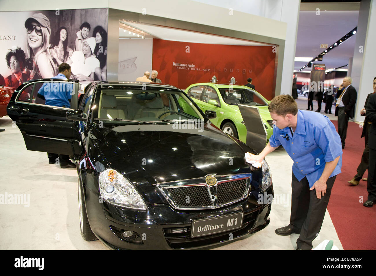 Detroit Michigan Workers polish the Chinese made Brilliance M1 at the North American International Auto Show Stock Photo