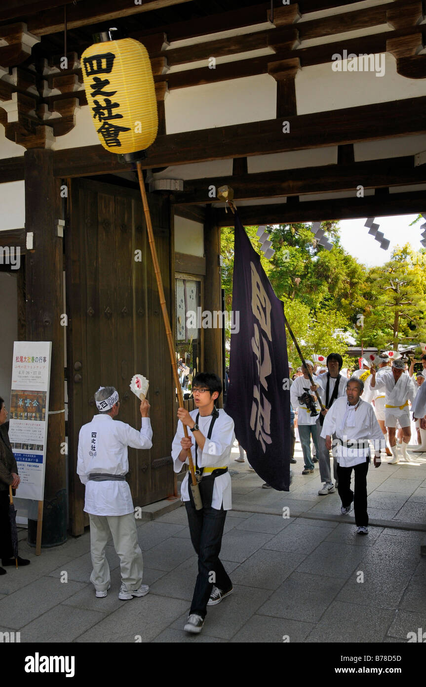 Lantern and handle carriers for the carrying frames of the shrine proceeding toward the shrine, Matsuri Shrine Festival of the  Stock Photo