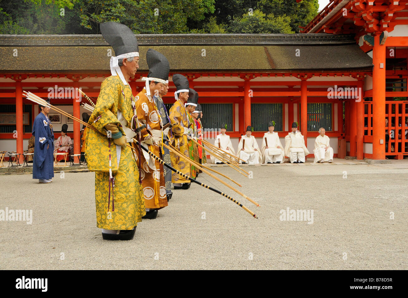 Archers at the archery ceremonial standing at shooting position in