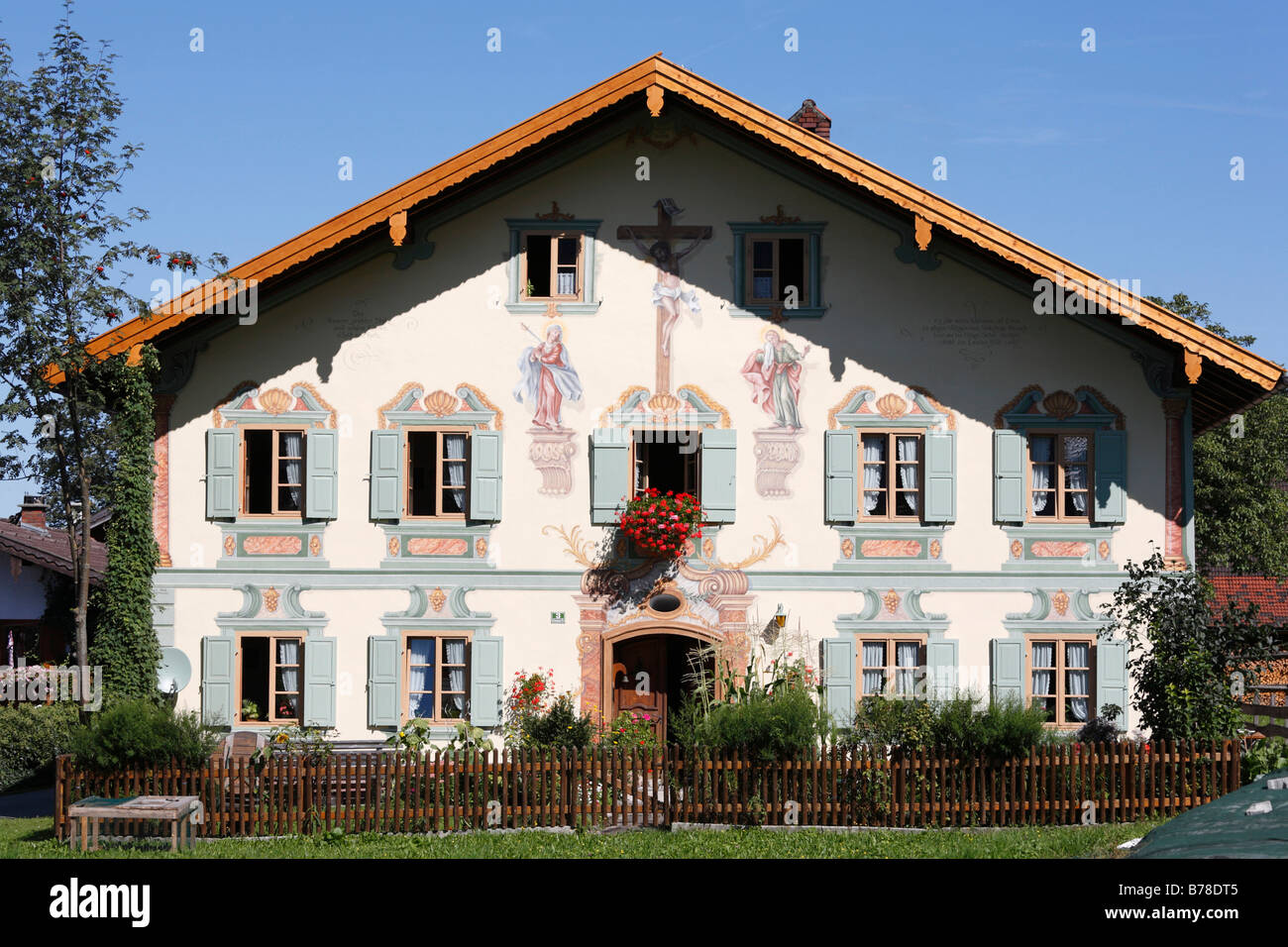 Old farm house with illusionistic facade painting in Ohlstadt, Upper Bavaria, Germany, Europe Stock Photo