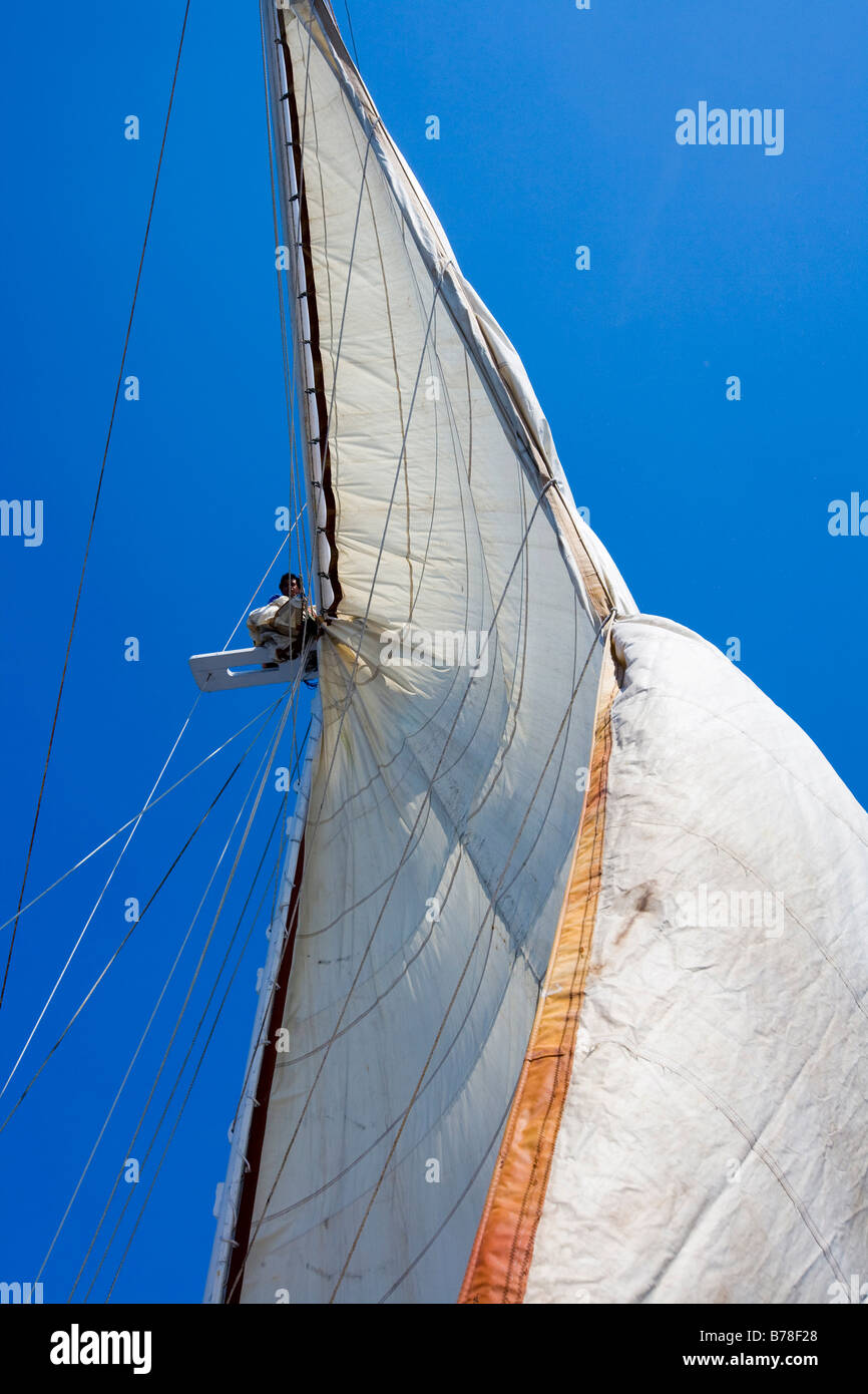 Man in the crow's nest of a sailing ship, Indonesia, Southeast Asia Stock Photo