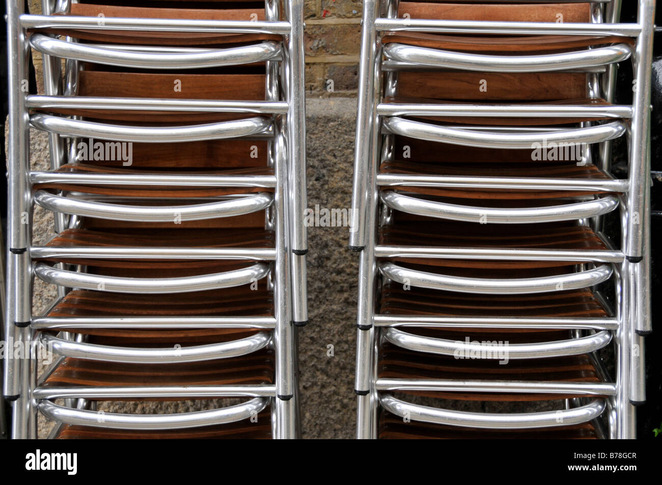 Stacked chairs closeup Stock Photo Alamy
