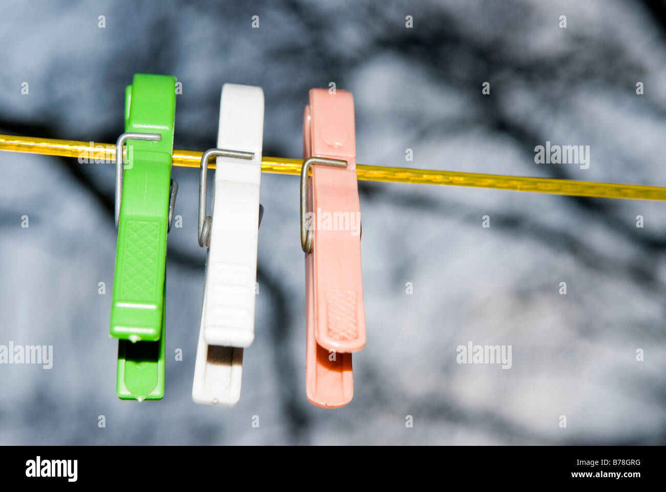 Clothespins on clothesline, close up Stock Photo Alamy