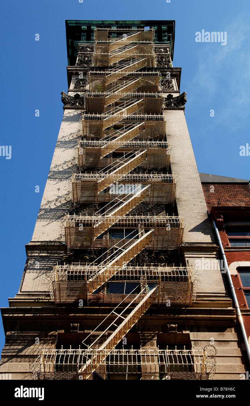 High rise with fire escape ladders, Downtown, New York City, USA, North America Stock Photo