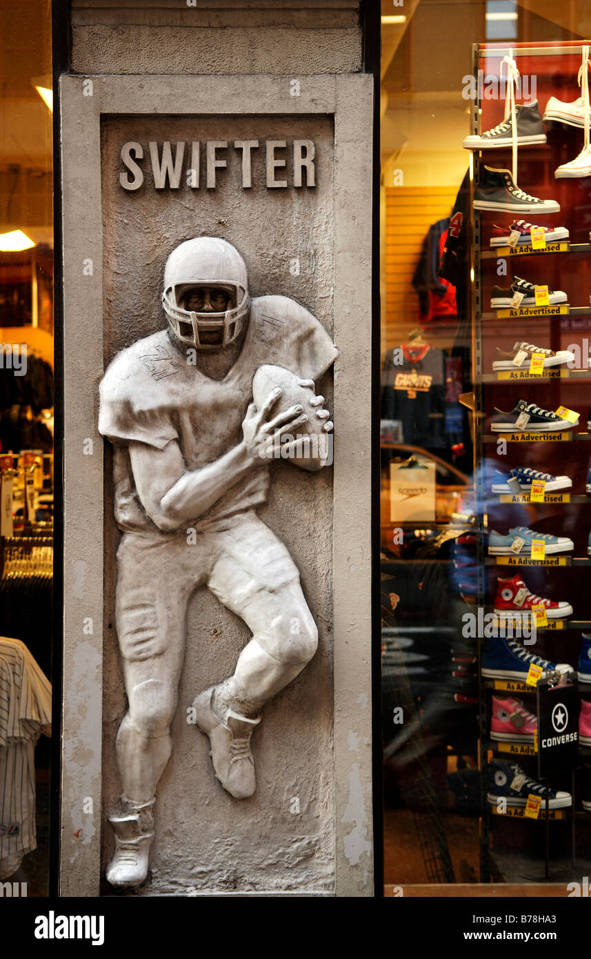 Rugby figure in a sports shop, New York City, USA Stock Photo