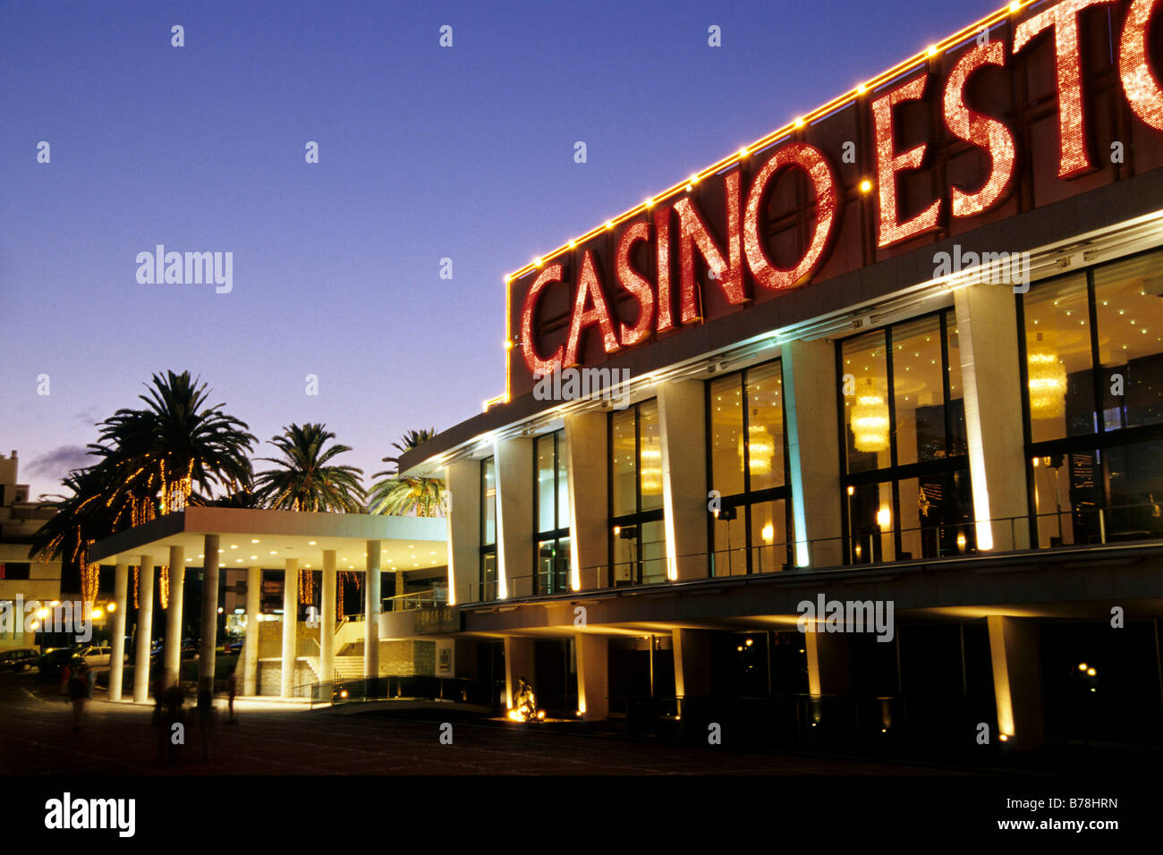 Casino Estoril in the evening, a casino in the tradition of modern architecture. Estoril, a mundane seaside resort grown togeth Stock Photo