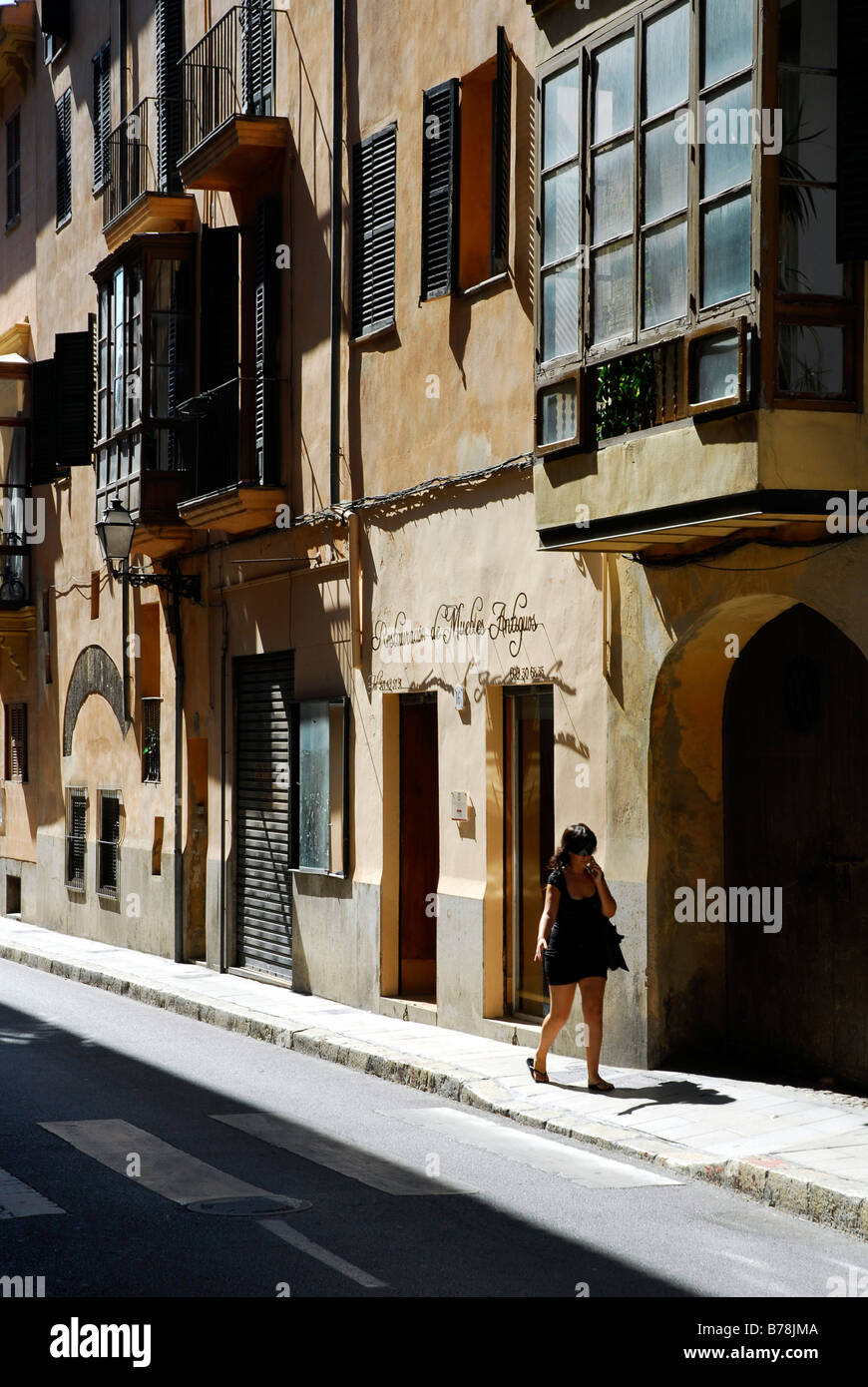 Facade with bay windows, street with traditional buildings in the ...
