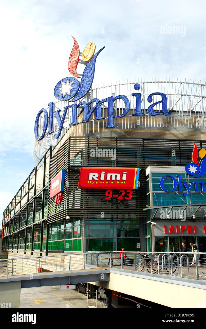 Tirdzniecibas centrs Olympia, modern shopping centre with neon signage on the facade on the Kipsala peninsula, Riga, Latvia, Ba Stock Photo