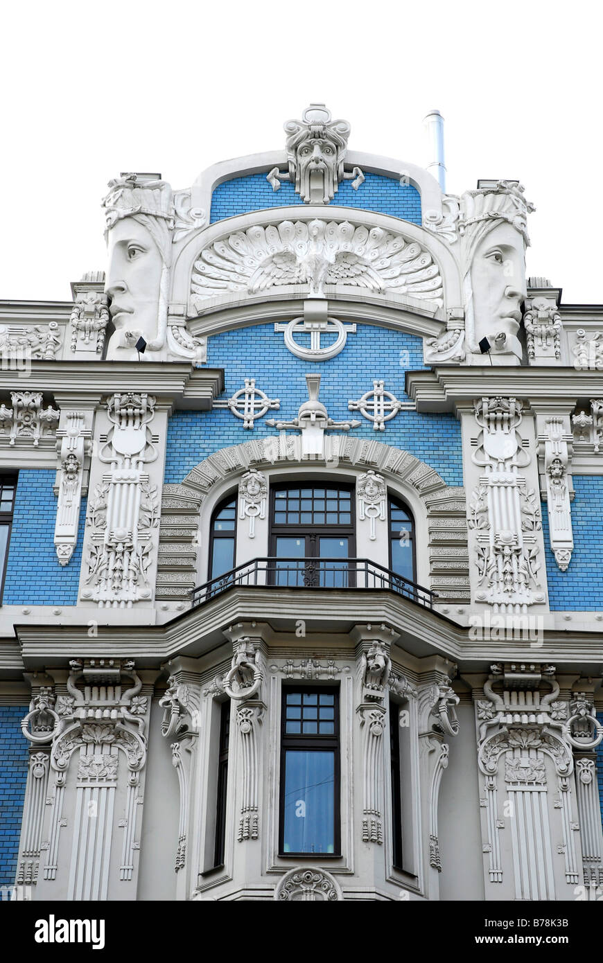 Art Nouveau facade with sculptures of faces in the Elizabetes iela