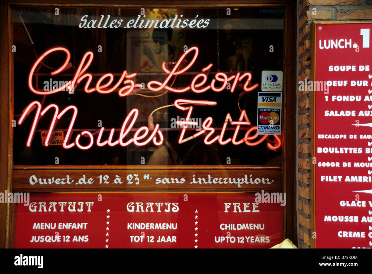 Chez Leon, Moules Frites, illuminated writing in a restaurant window, Rue des Bouchers, Ilot Sacre, Brussels, Belgum, Benelux,  Stock Photo