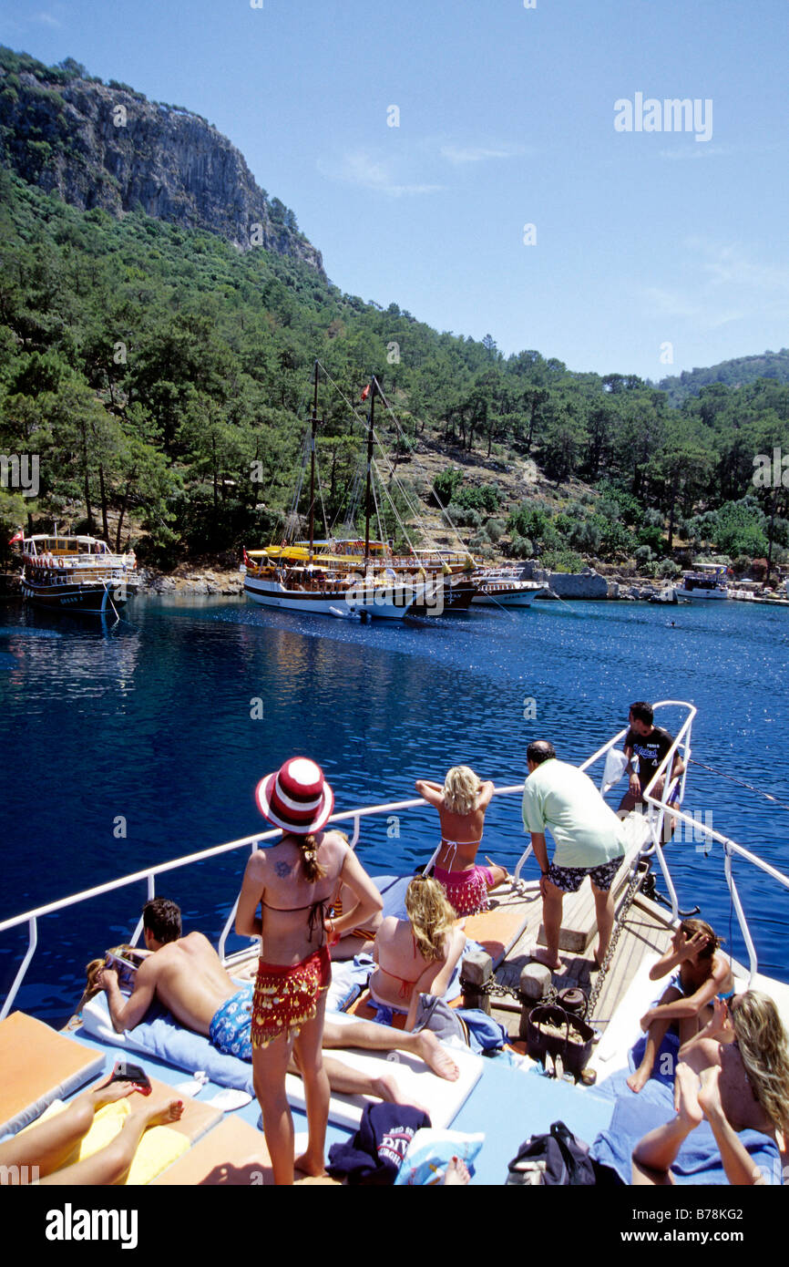 Tourism in the Cleopatra Hamami Bay, ancient bathing resort, yachts in the Bay of Fethiye, Mugla Province, Mediterranean, Turkey Stock Photo