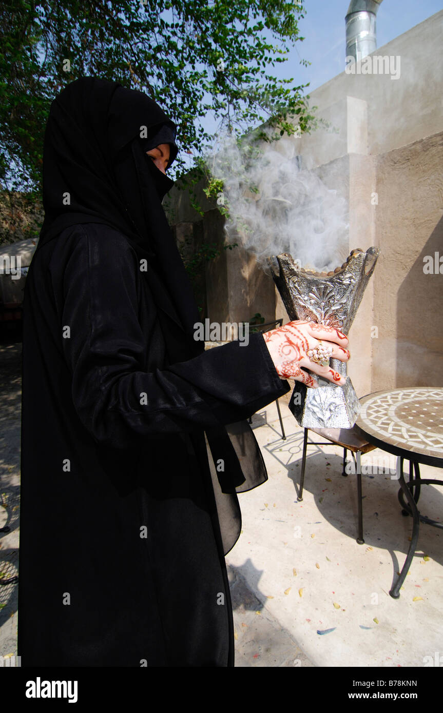 Incense woman hold hi-res stock photography and images - Alamy