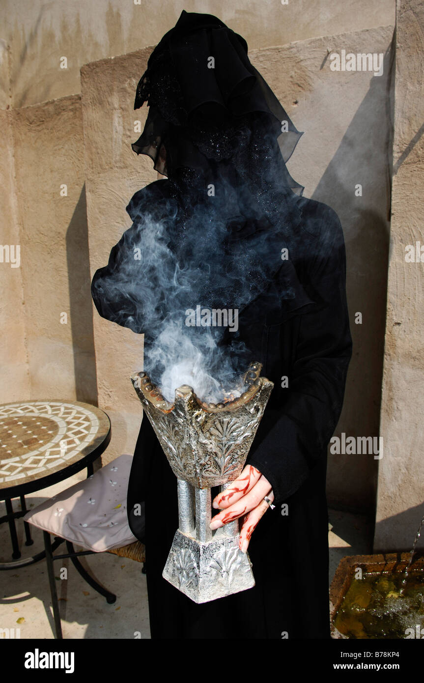 Incense woman hold hi-res stock photography and images - Alamy