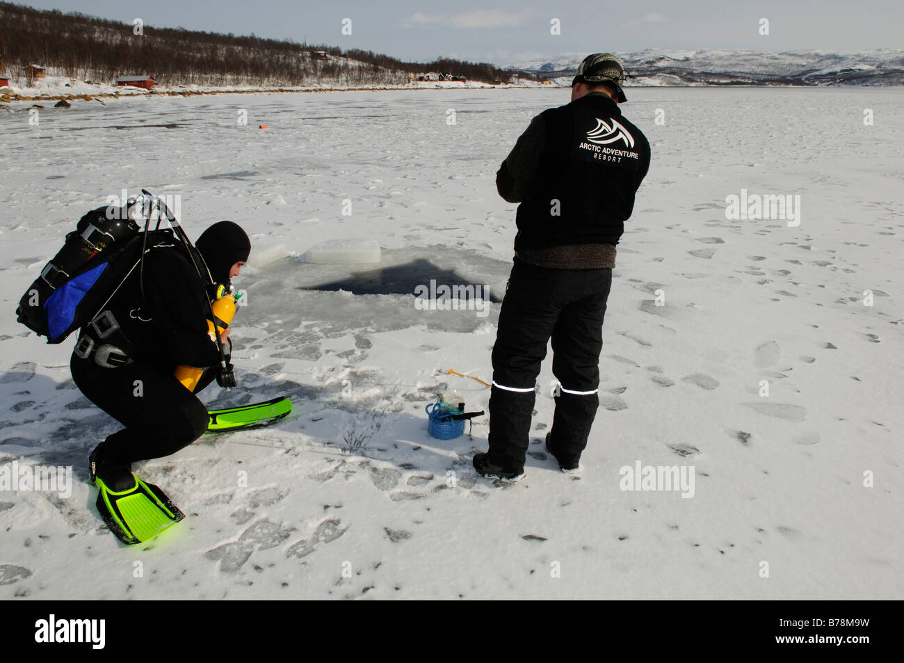 Scuba diver before diving in the fjord for king crabs, Kirkenes