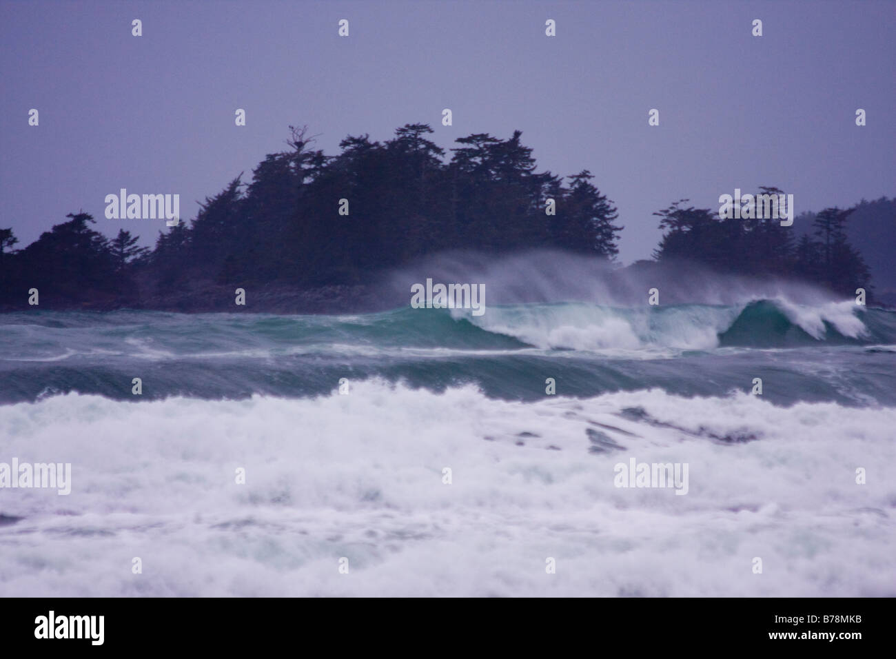 Wind blowing spray off the top of a wave on the rugged west coast of