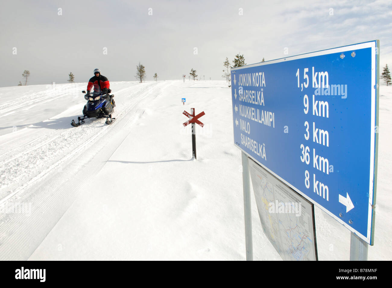 Snowmobile on a tour in the Saariselkae skiing area, Ivalo, Lapland