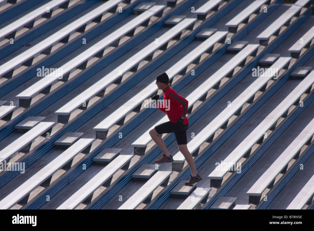 A man running up stairs while training in Reno in Nevada Stock Photo