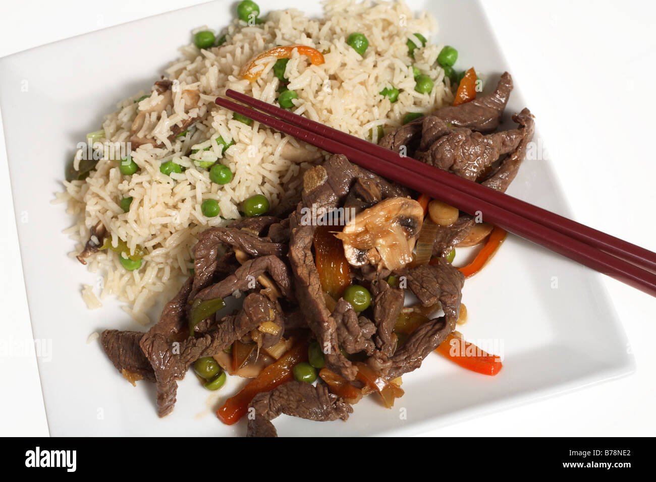 Asian-style stir-fried beef and vegetable fried rice Stock Photo - Alamy