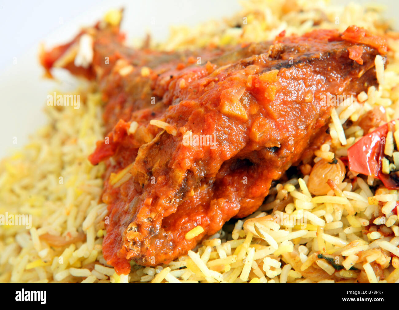 Gulf Arab fish majboos (fish baked in tomato and onion sauce,with rice