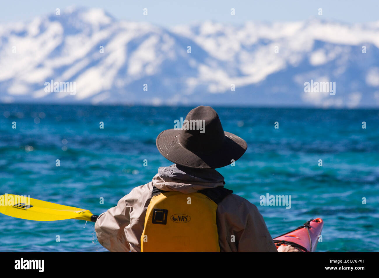 A man sea kayaking on Lake Tahoe near Incline Village in Nevada Stock