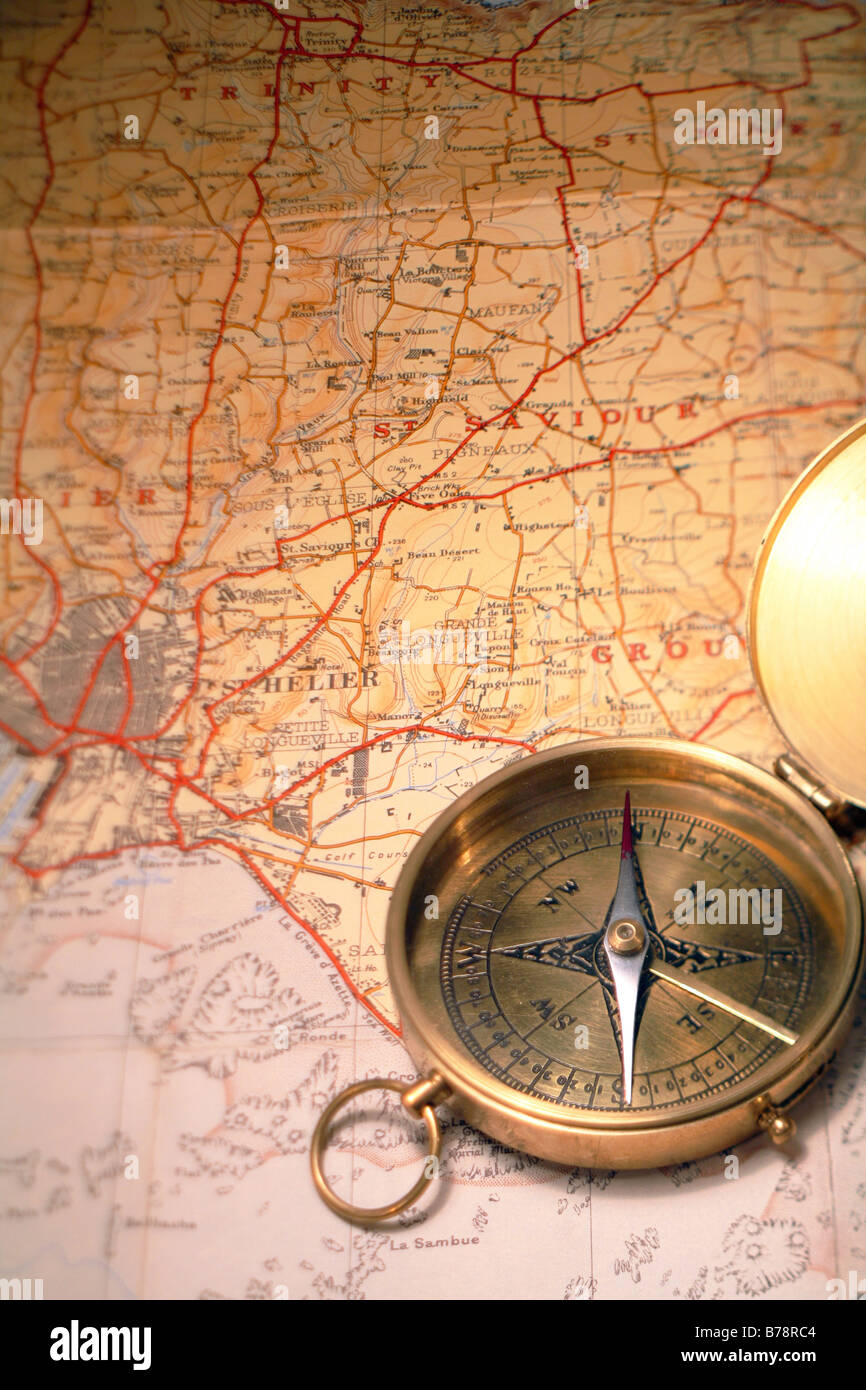 Ordinary magnetic compass on a 1930s map of Jersey,in the Channel Islands Stock Photo