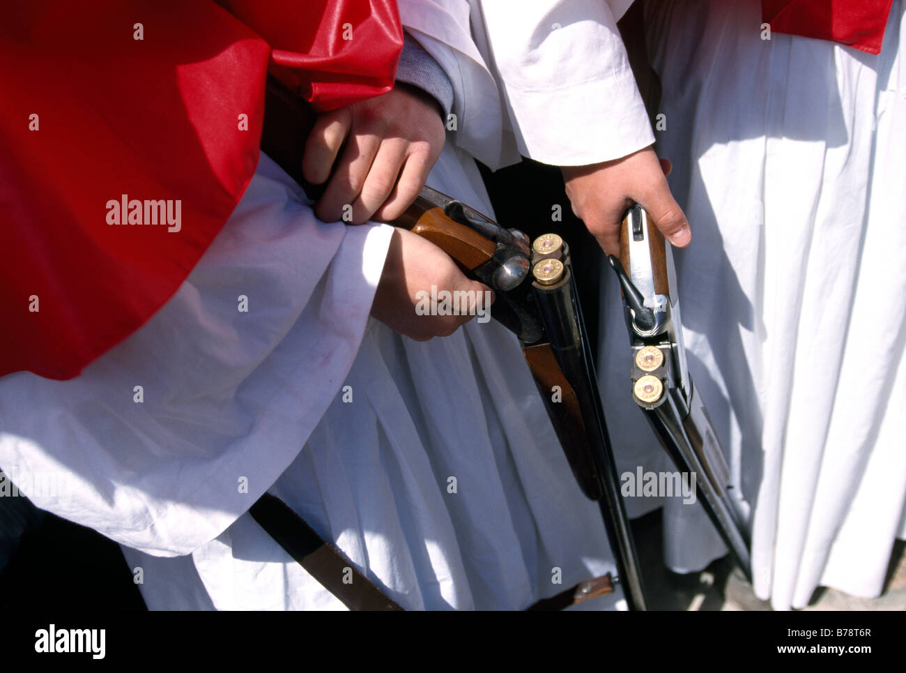 Gun salutes with shotgun at Greek-Orthodox Easter procession, Cargese, Corsica, France, Europe Stock Photo