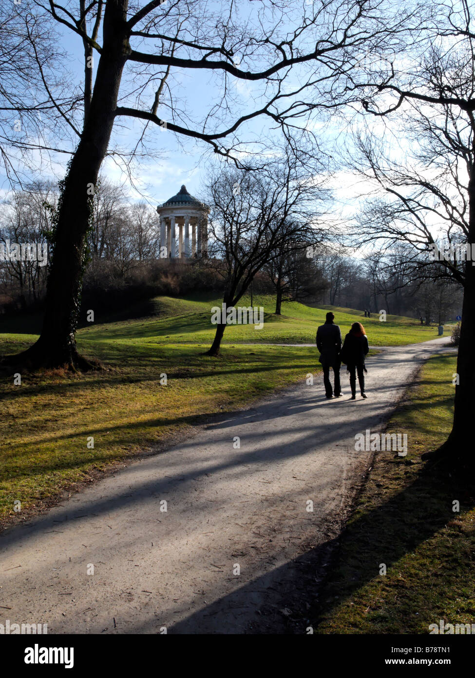 Monopteros People Walking on Pathway  in the English Garden Munich Germany Stock Photo