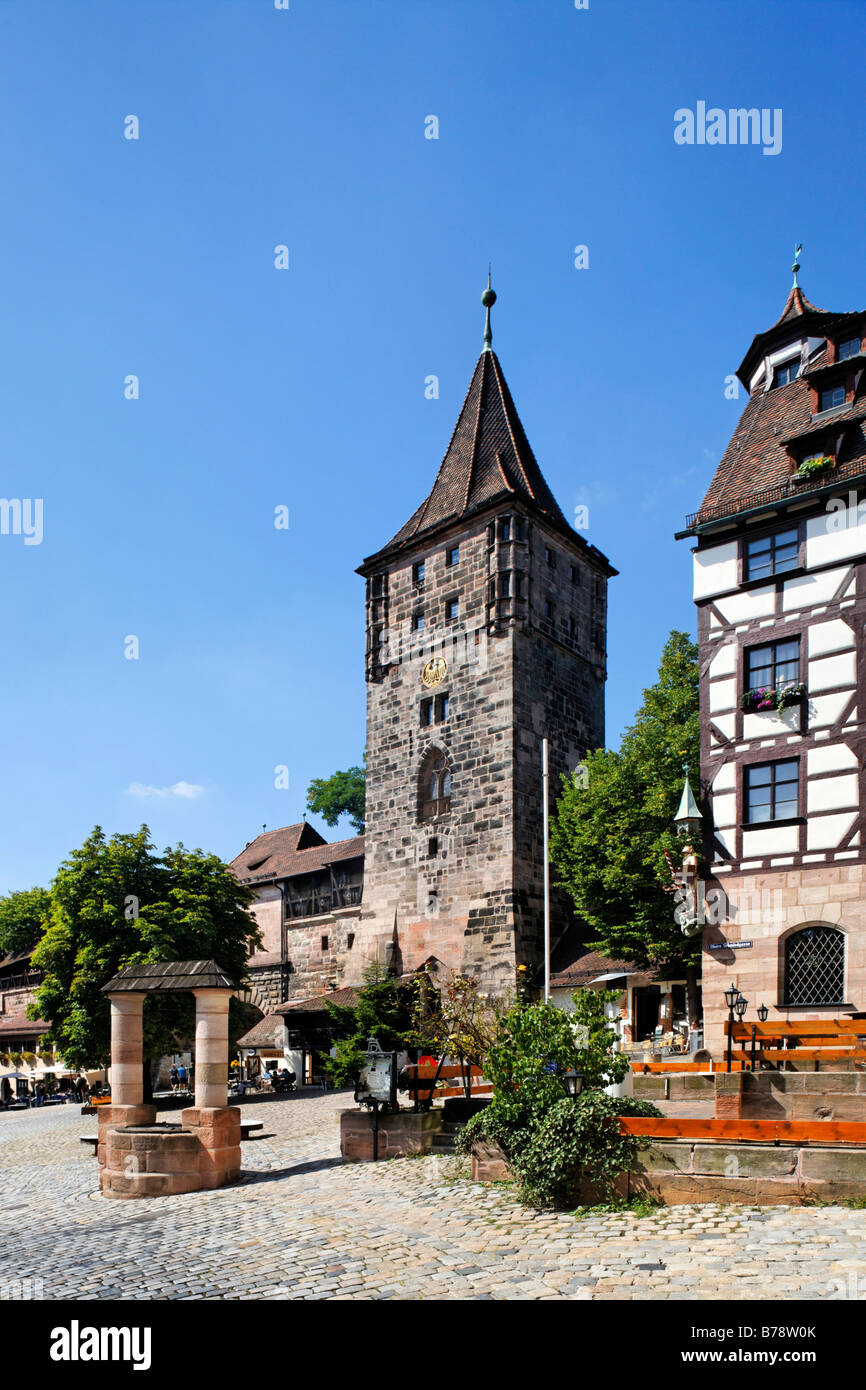 Tower with fountain at Tiergaertnertor, Pilatus house, old city, Nuremberg, Middle Franconia, Bavaria, Germany, Europe Stock Photo