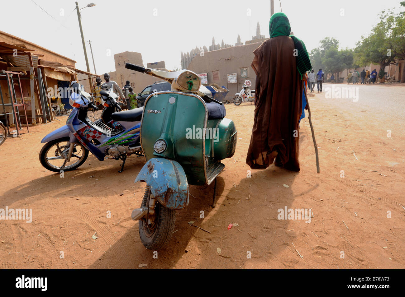 An old Vespa parked in on the side of the road in Mopti , Mali, West Africa Stock Photo