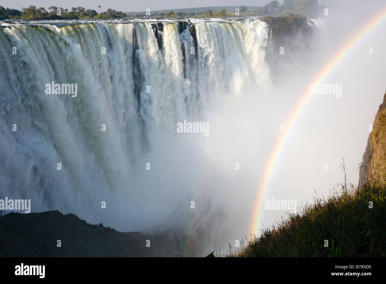 Victoria falls on the Zambezi river with a rainbow Stock Photo