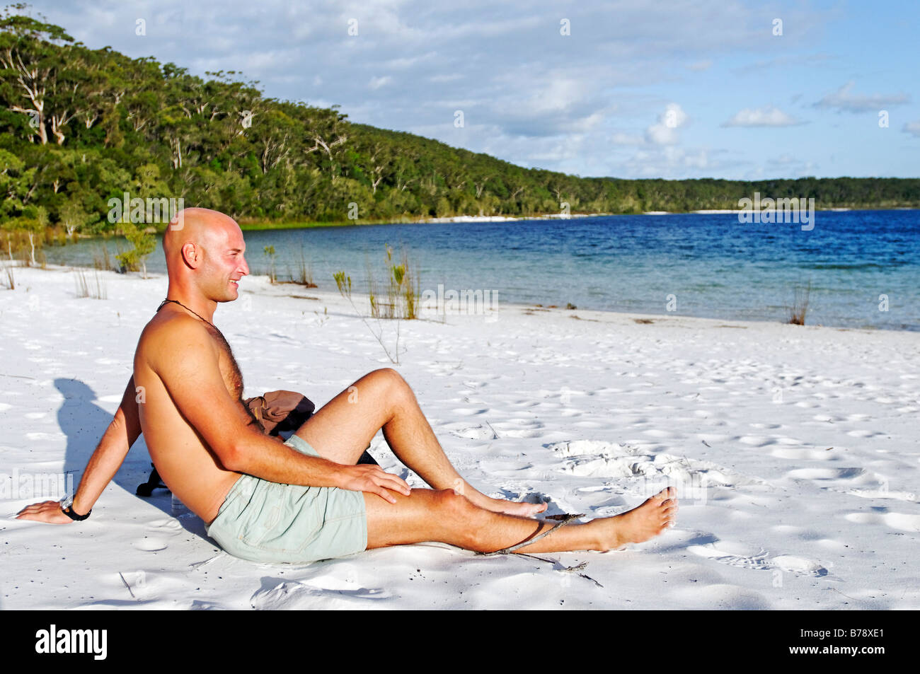 Man on the beach at Lake McKenzie, Fraser Island, Queensland, Australia Stock Photo