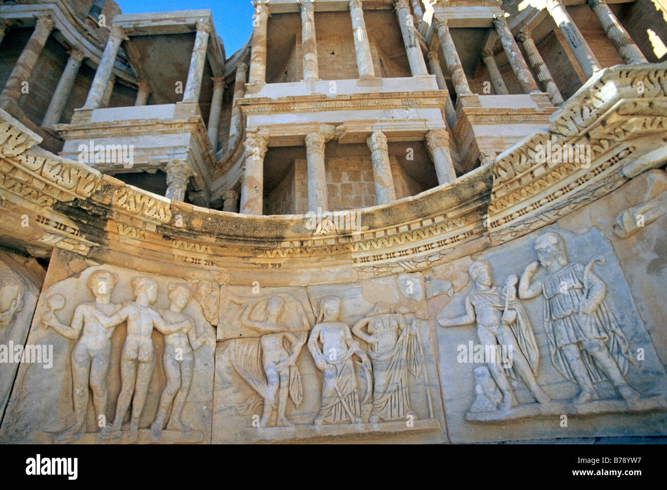 Bas-relief of several carved Roman figures at ruins of Sabratha Stock Photo