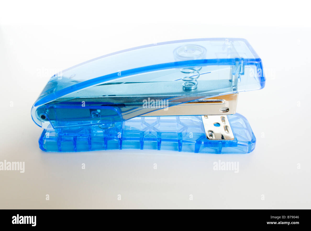 Blue transparent stapler. Stock Photo
