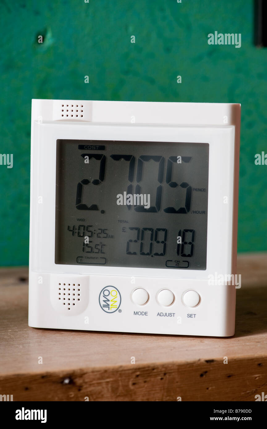 A digital wireless display device for monitoring domestic electricity usage consumption at home UK Stock Photo