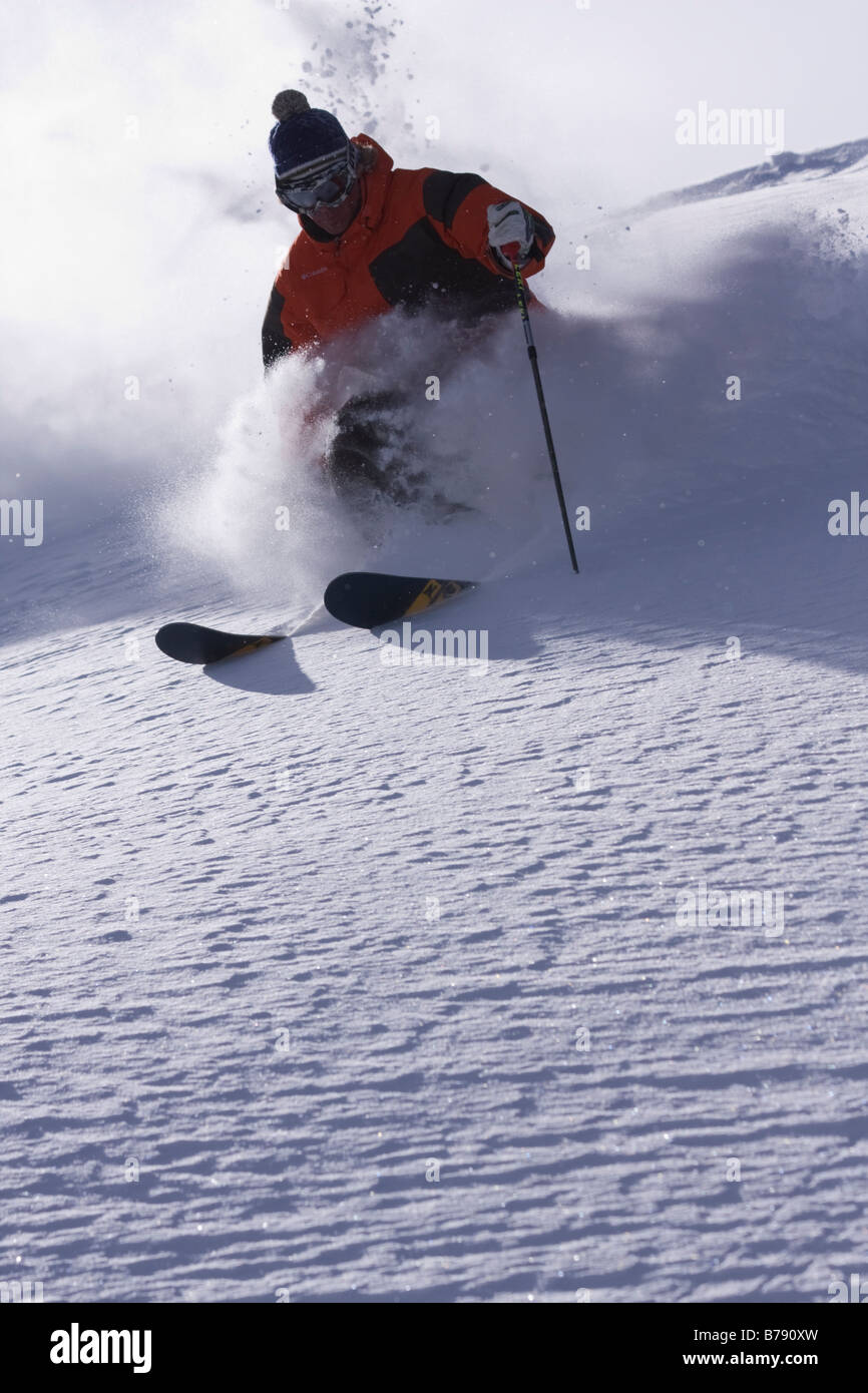 A man skiing powder snow at Northstar at Tahoe ski area near Lake Tahoe in California Stock Photo