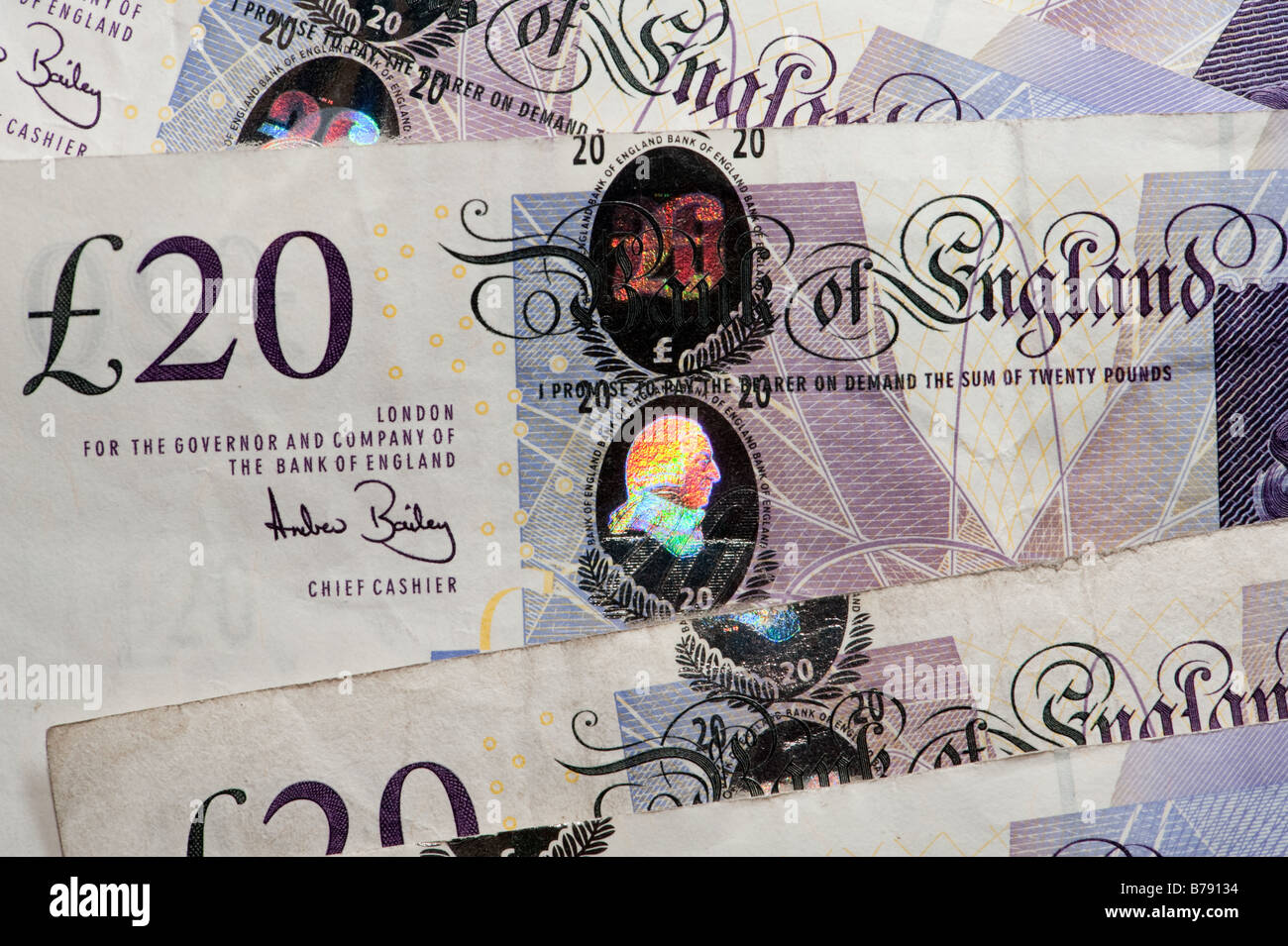 UK united kingdom £20 twenty pound bank note notes cash sterling currency money bills quid quids english british britain Stock Photo