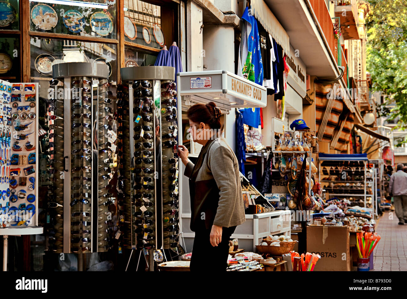 Woman shopping for souvenirs in the tourist market of Nicosia Cyprus Stock Photo