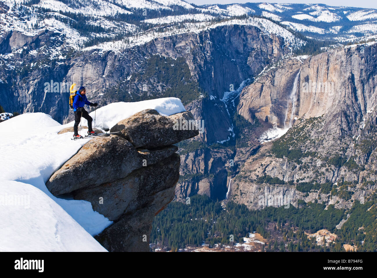 Backcountry skier and Yosemite Falls from Glacier Point Yosemite