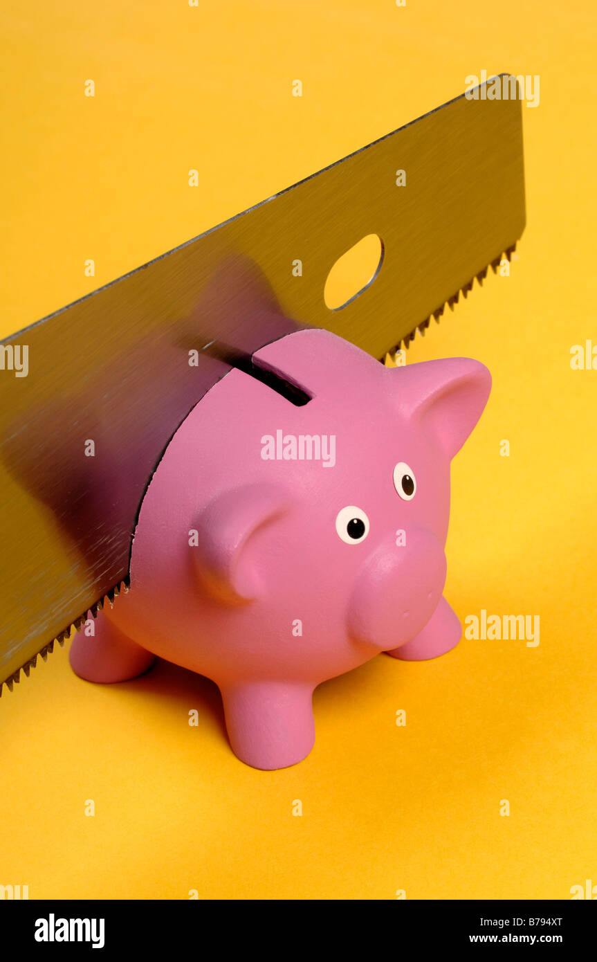 Savings cut in half Stock Photo